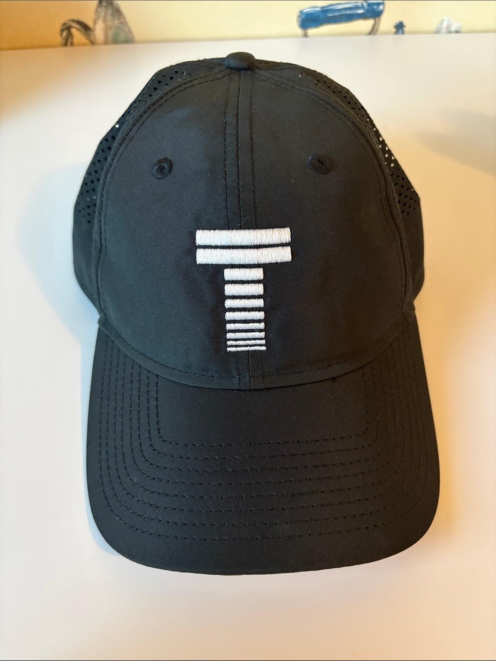 New Era Black Cap with White Stacked Bar Embroidery “T”